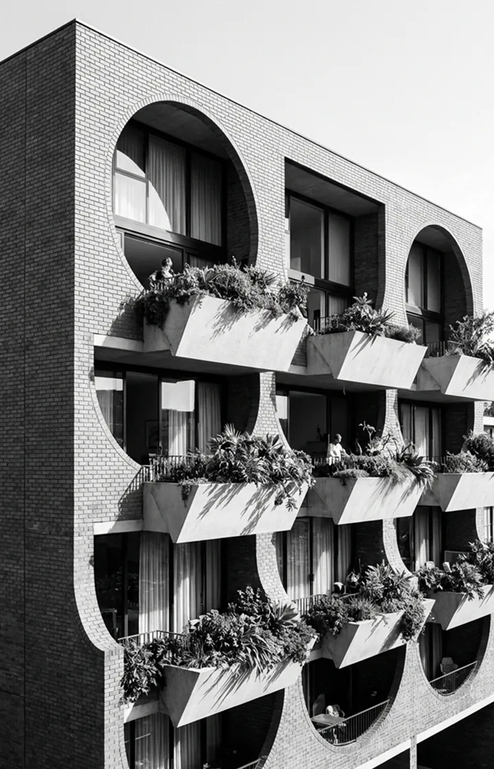 brutalist geometric balconies, repeating curved brick shapes, lush plants, black-and-white architectural photograph atmosphere