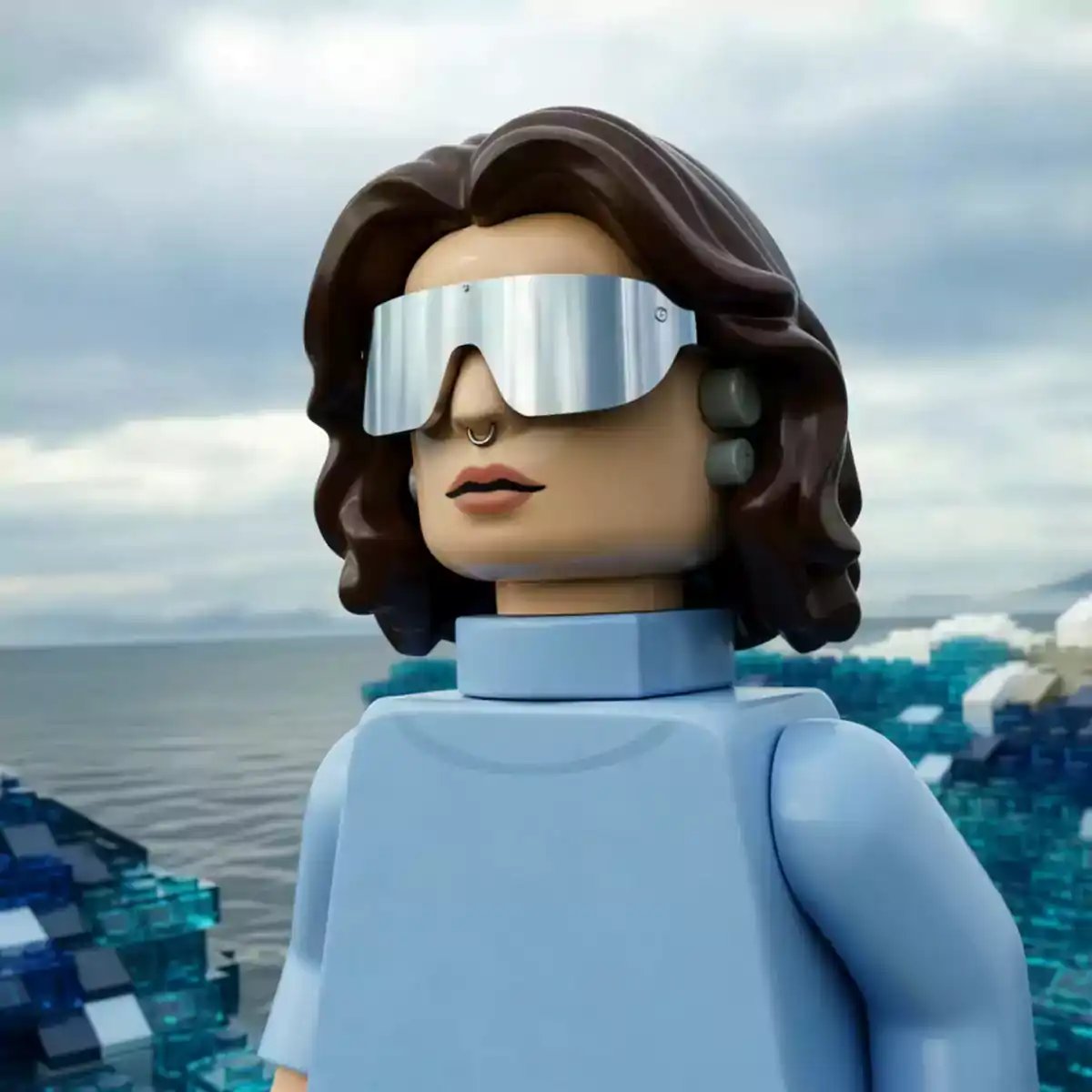 A hyperrealistic photorealistic AI avatar with brown hair and reflective sunglasses waves in front of a scenic ocean background, demonstrating features of an AI video generator with lip sync AI and AI avatar generator capabilities.